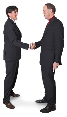 Two men shaking hands and teaming up for optimal health in corrective care
