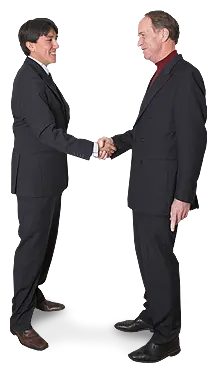 Two men shaking hands and teaming up for optimal health in corrective care