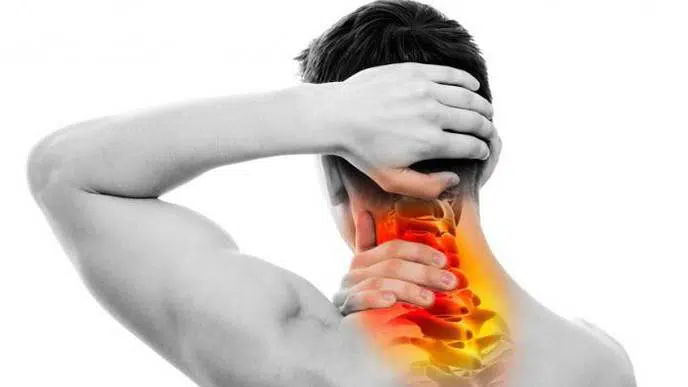 Man needing chiropractic neck pain treatment in the Woodlands.