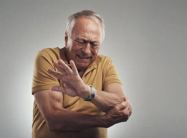Senior man suffering from joint stiffness cause of arthritis 