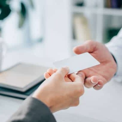 Patient giving his card insurance to then billing station