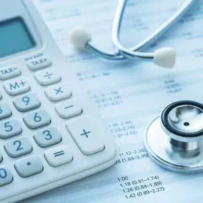 Calculator and insurance form healthcare concept