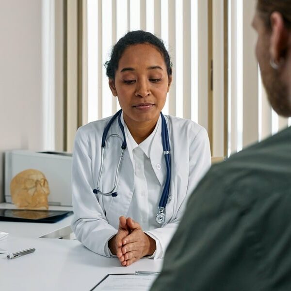 Patient is having a consultation with a chiropractor