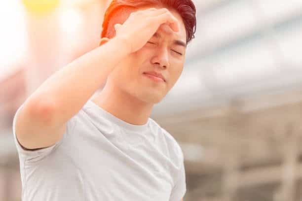 Man suffers from Dehydration while walking under the sun