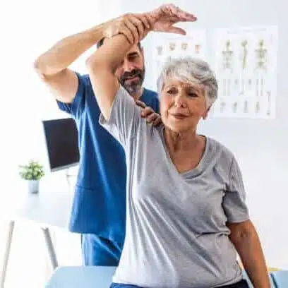 osteopath helping the patient to under go in physical therapy.