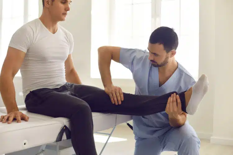 Patient having some physical therapy session at the chiropractic clinic.