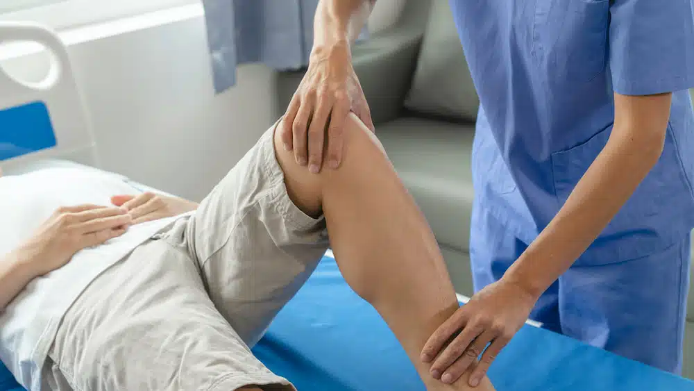 Chiropractor treating a patient that is having a sports injury
