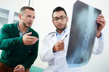 Discussing x-ray with patient