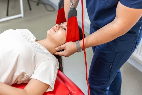Physical Rehabilitation for whiplash performed at a clinic
