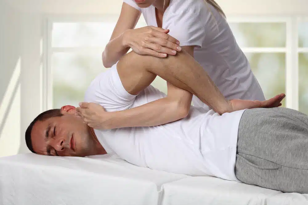 A man having a back chiropractic