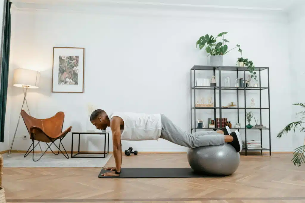 A Man Working Out With a Yoga Ball