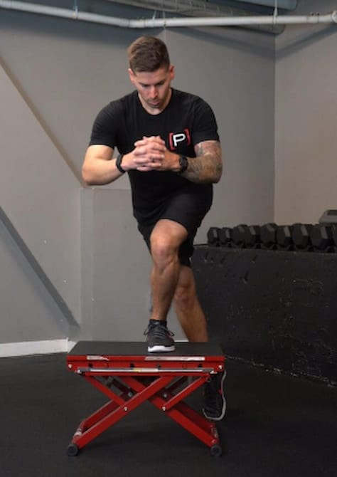 Man doing step platform to exercise