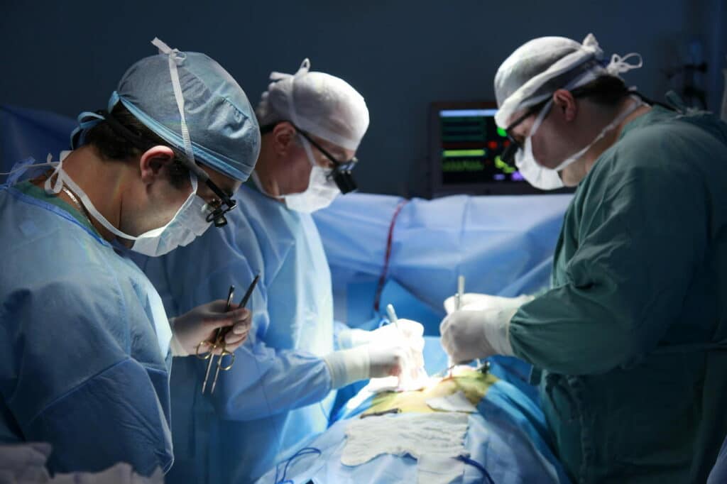 Doctors Operating on a Patient